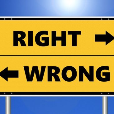 Two arrows facing opposite direction with the words 