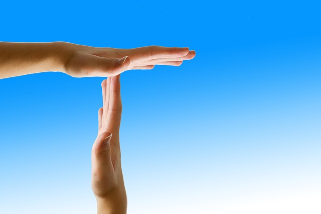 Two hands making a time out signal