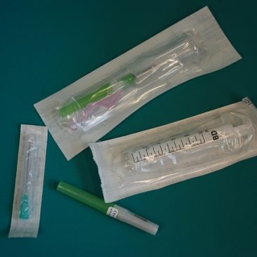 packages of needles in a lab