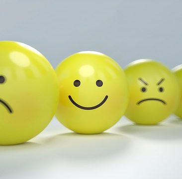 Four smileys showing four different emotions.