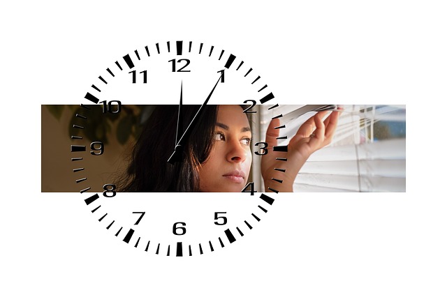 face, hand, clock in background
