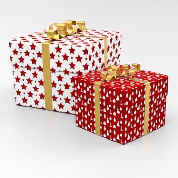 two gift boxes with bows
